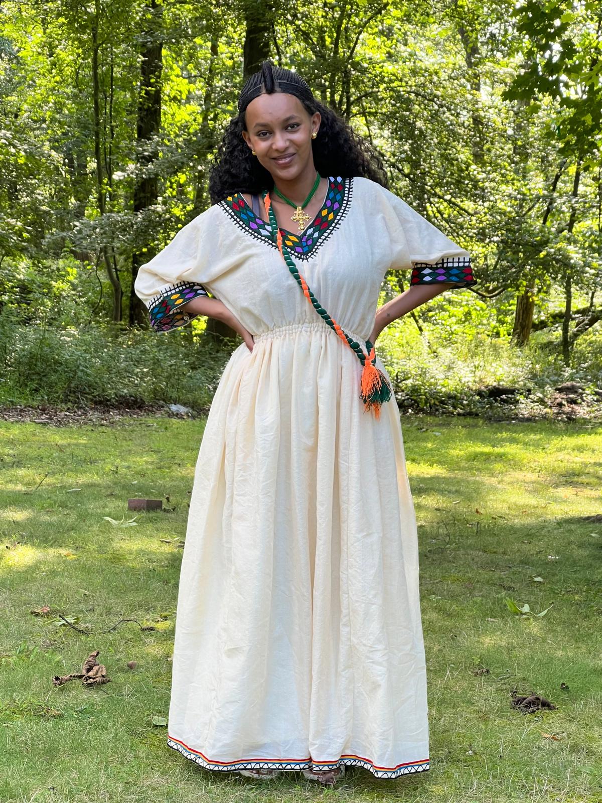 Traditional Cream Ethiopian Dress with Colorful Neckline and Sleeve Embroidery