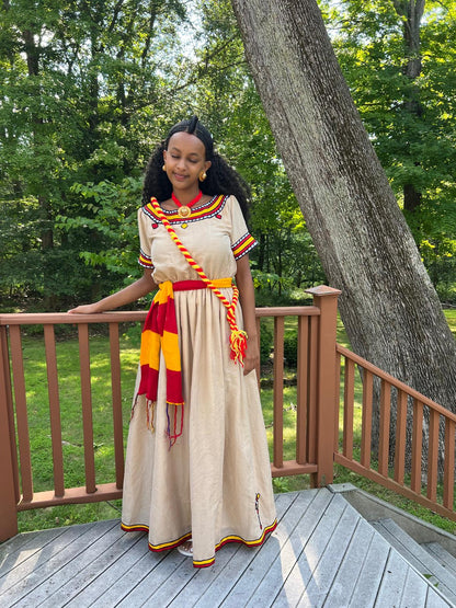 Traditional Cultural Dress with Red, Yellow, and Black Accents