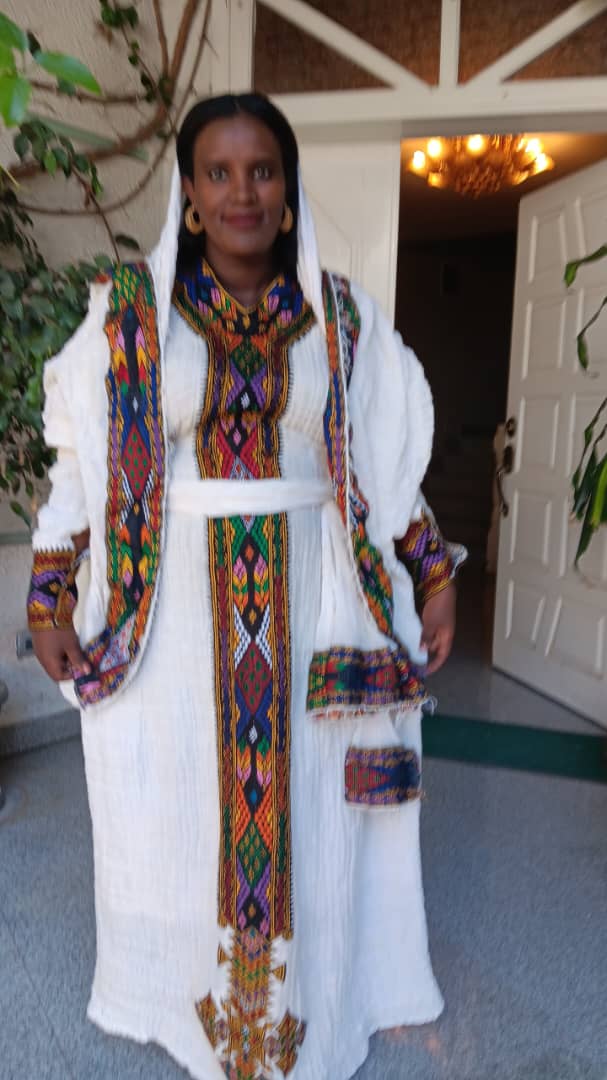 Ethiopian White Traditional Dress with Vibrant Handwoven Patterns