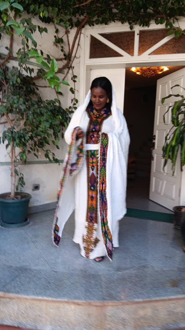 Ethiopian White Traditional Dress with Vibrant Handwoven Patterns